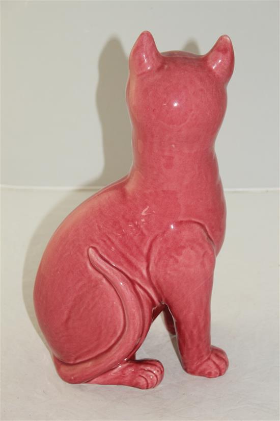 After Louis Wain. A Weymss pink glazed model of a seated cat, 32.5cm